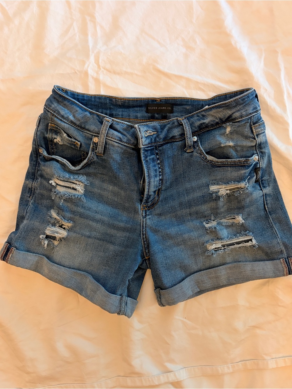Silver Jeans Rolled Hem Distressed Blue Denim Shorts